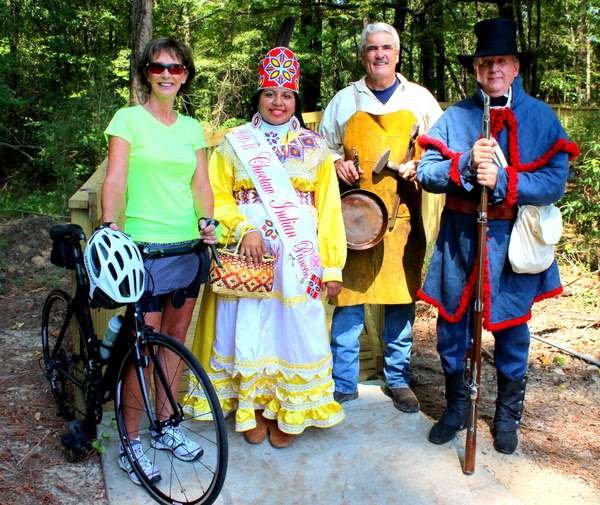 Pictured, representing how the new Natchez Trace Boardwalk will benefit the area are: Mina Thorgeson of Ridgeland Tourism (recreation), Choctaw Indian Princess Breanna Layne Issac (culture), Jim Pigott of the Craftsmen's Guild of MS (arts), and Tom Watts of the Natchez Trace Parkway Association (history).