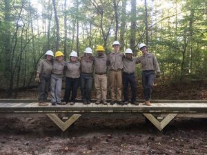 Crew members test the newly constructed bridge.